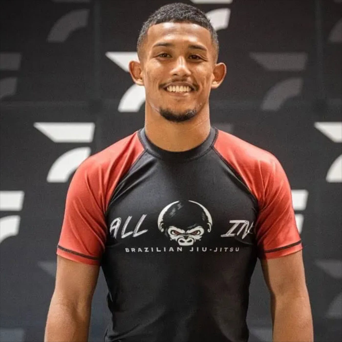 Damien Anderson of B-Team Jiu-Jitsu wearing a rash guard during a Brazilian Jiu-Jitsu training camp
