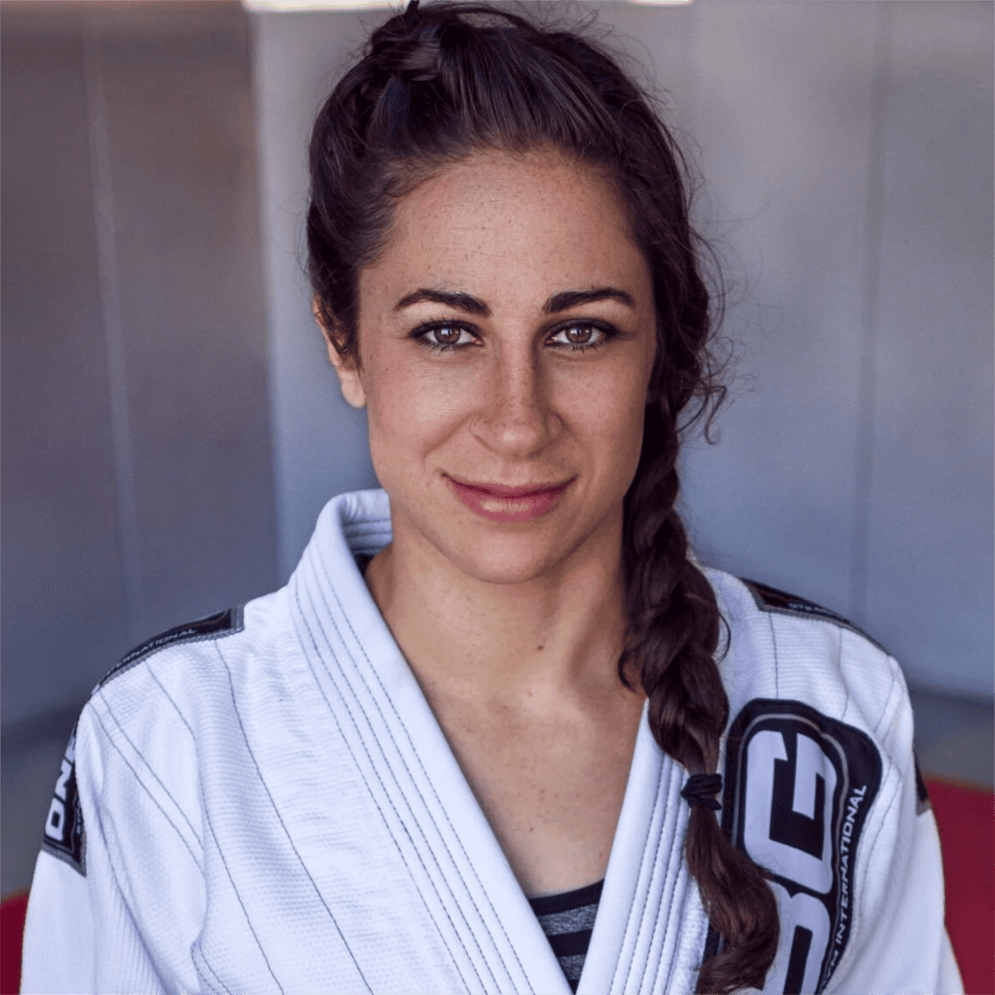 Leah Stumpf, Brazilian Jiu-Jitsu black belt instructor, wearing a gi at a BJJ training camp