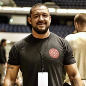 Tom DeBlass, Brazilian Jiu-Jitsu black belt instructor, pictured at a high-level BJJ comp
